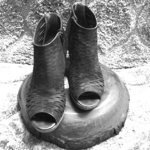 Black Suede “peep toe” style shoes .